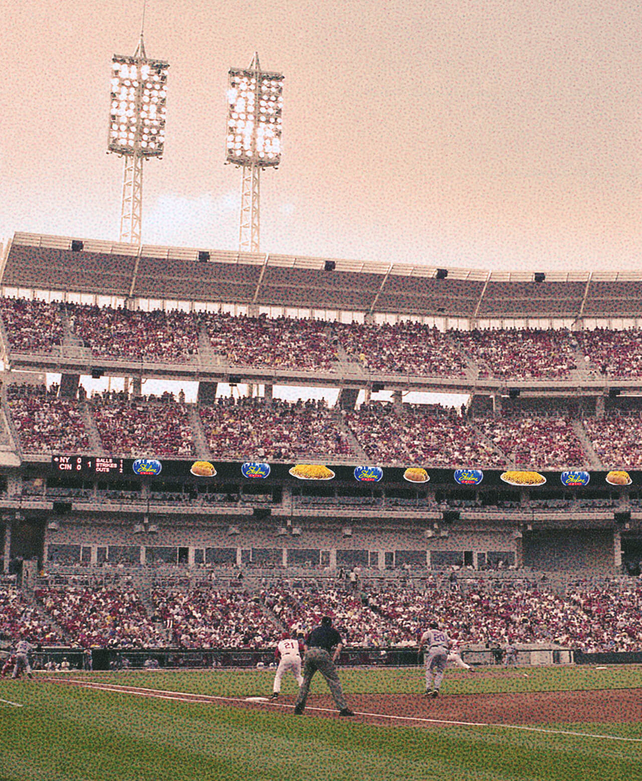 Reds stadium during a Reds game with Skyline advertisement on the billboard