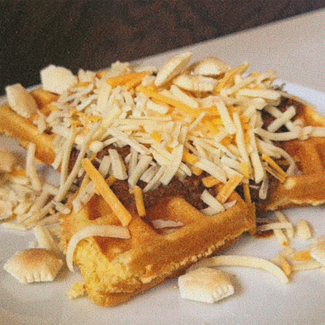 Cornbread waffles with Chili and Cheese on top