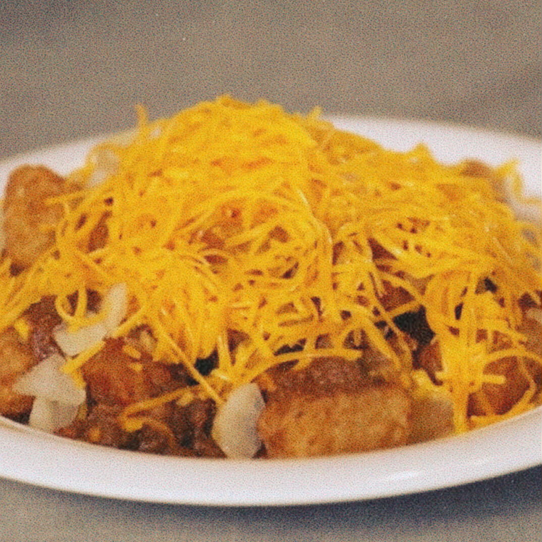 Tator tots with chili onions and cheese